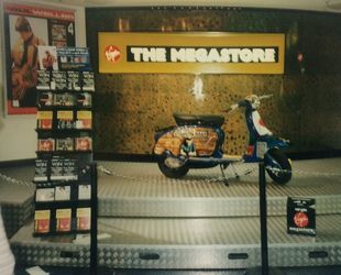 The prize SX on display inside the store