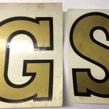 Gold "GS" legshield "Decorettes" 5" (127 mm)